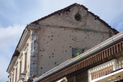 Like in Sarajevo, the buildings show scars left from from the war.